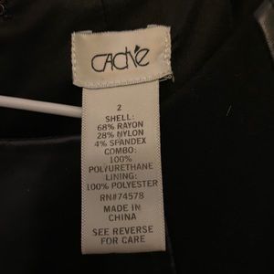 Black dress with leather trimming